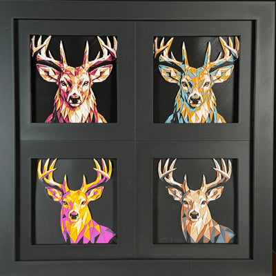 Four-panel framed geometric Buck Deer layered 3D art set showing the Buck deer design in Heritage, Crimson Ice, Royal Gold, and Teal Orange color palettes inside a charcoal matte four-pack display frame.
