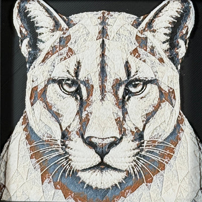 Geometric mountain lion framed layered 3D art in Heritage color palette, featuring a bold mountain lion portrait with soft white, gray, black, and neutral brown layered details inside a charcoal matte display frame.