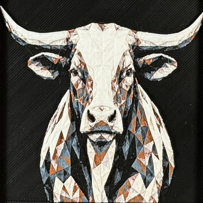 Geometric steer framed layered 3D art in Heritage color palette, featuring a bold steer portrait with soft white, gray, black, and neutral brown layered details inside a charcoal matte display frame.