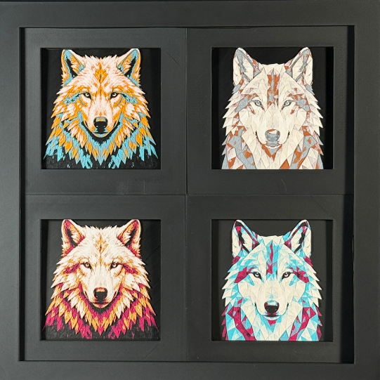 Four-panel framed geometric wolf layered art set showing the same front-facing wolf portrait in four WTX3D color palettes, arranged in a charcoal black 2x2 frame with sharp ears, detailed fur texture, and high-contrast layered color.