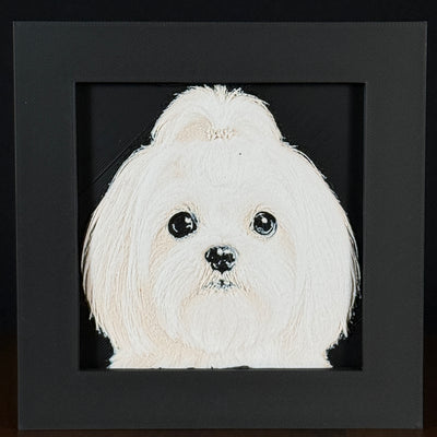 Framed 3D layered art piece featuring a highly detailed, textured portrait of a Maltese dog with dark expressive eyes, a fluffy topknot, and a classic white coat.