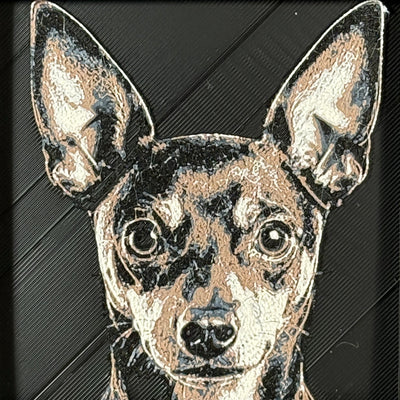 Framed 3D layered art piece featuring a highly detailed, textured portrait of a Miniature Pinscher dog with large erect ears, alert eyes, and a classic black and tan coat pattern.