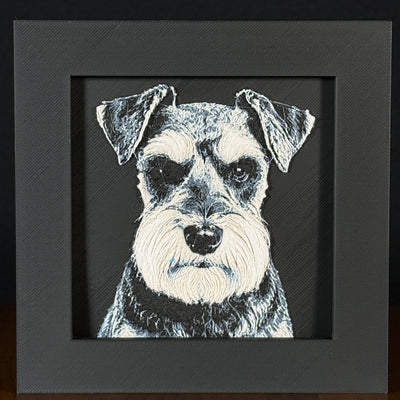 Framed 3D layered art piece featuring a highly detailed, textured portrait of a Schnauzer dog with a distinctive bushy beard and eyebrows, alert eyes, and a classic black and white coat pattern.