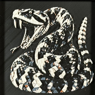Geometric rattlesnake layered art in Heritage palette in a black frame