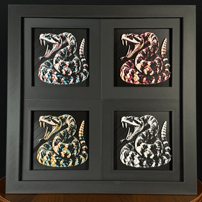 Geometric rattlesnake layered art four-pack showing multiple color palettes in a black frame