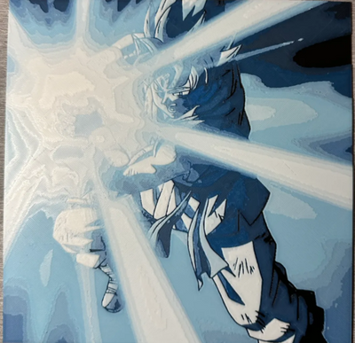 Framed 3D layered art piece featuring a powerful action illustration of an anime hero firing a massive, brilliant blue energy beam from their hands.