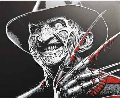 Framed 3D layered art piece from image_904fd8.png featuring a detailed grayscale portrait of a burned horror slasher villain wearing a fedora hat, grinning maliciously while raising his iconic razor-blade claw glove covered in a pop of vivid red blood splatters.