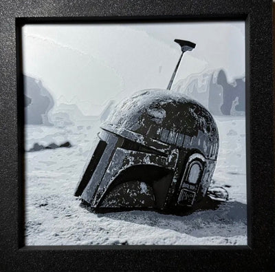 Framed 3D layered art piece featuring a sci-fi bounty hunter helmet in grayscale.