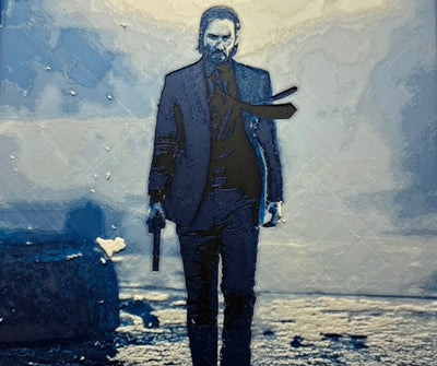 Framed 3D layered art piece featuring a tactical hitman in a blue palette.