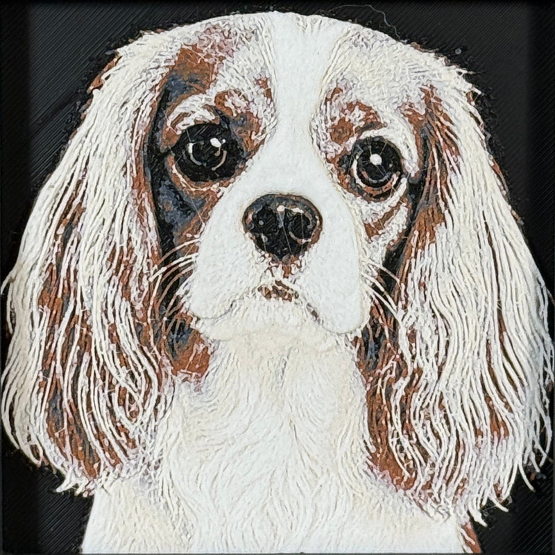 Framed 3D layered art piece featuring a highly detailed, textured portrait of a Cavalier King Charles Spaniel dog with long silky ears, large expressive eyes, and a brown and white coat pattern.