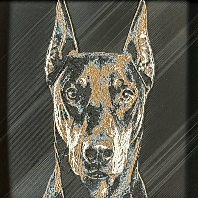 Custom framed 3D layered art piece showing a Doberman dog, printed in layers by WTx3D.