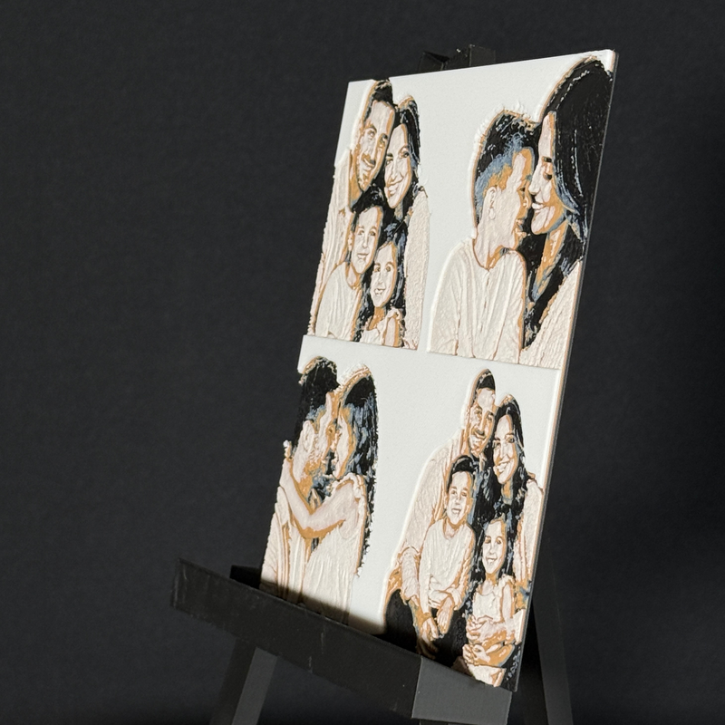 Custom framed 3D layered art piece showing a family of four, printed in layers by WTx3D.