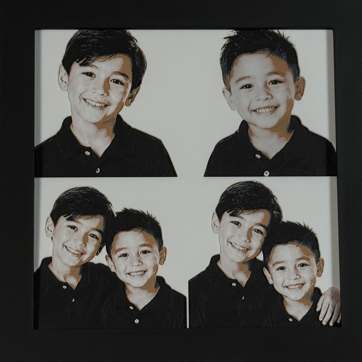 Custom framed 3D layered art piece showing two brothers, printed in layers by WTx3D.