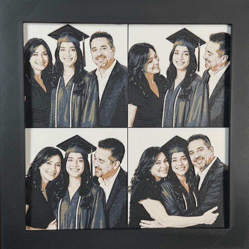 Custom framed 3D layered art piece showing a family celebrating their daughter's graduation, printed in layers by WTx3D.