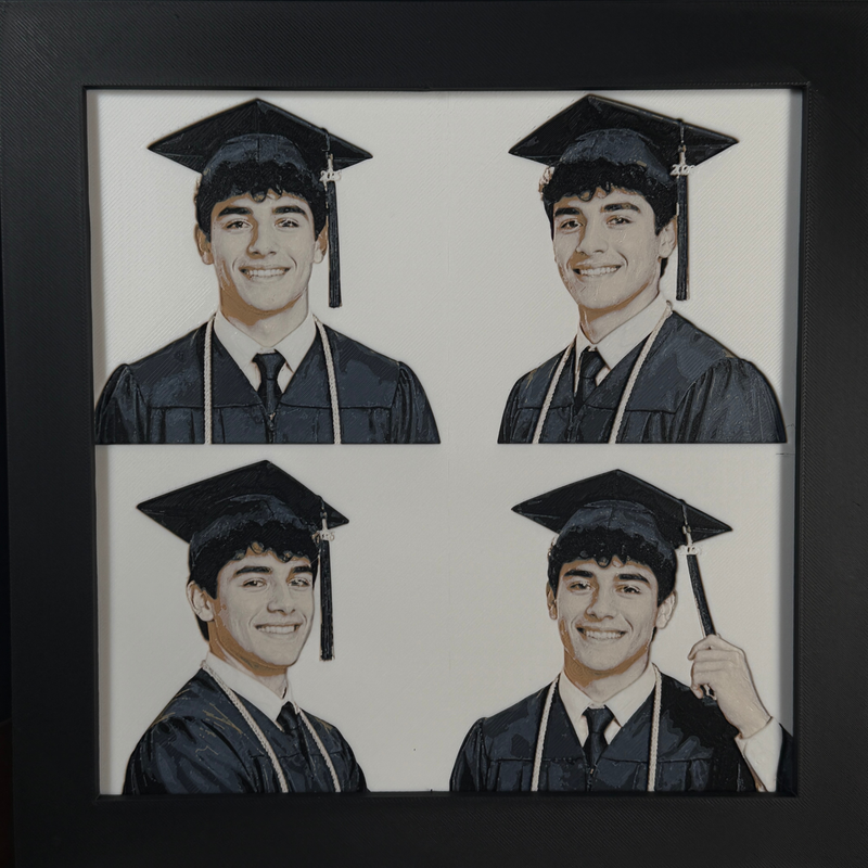 Custom framed 3D layered art piece showing a high school senior in cap and gown, printed in layers by WTx3D.