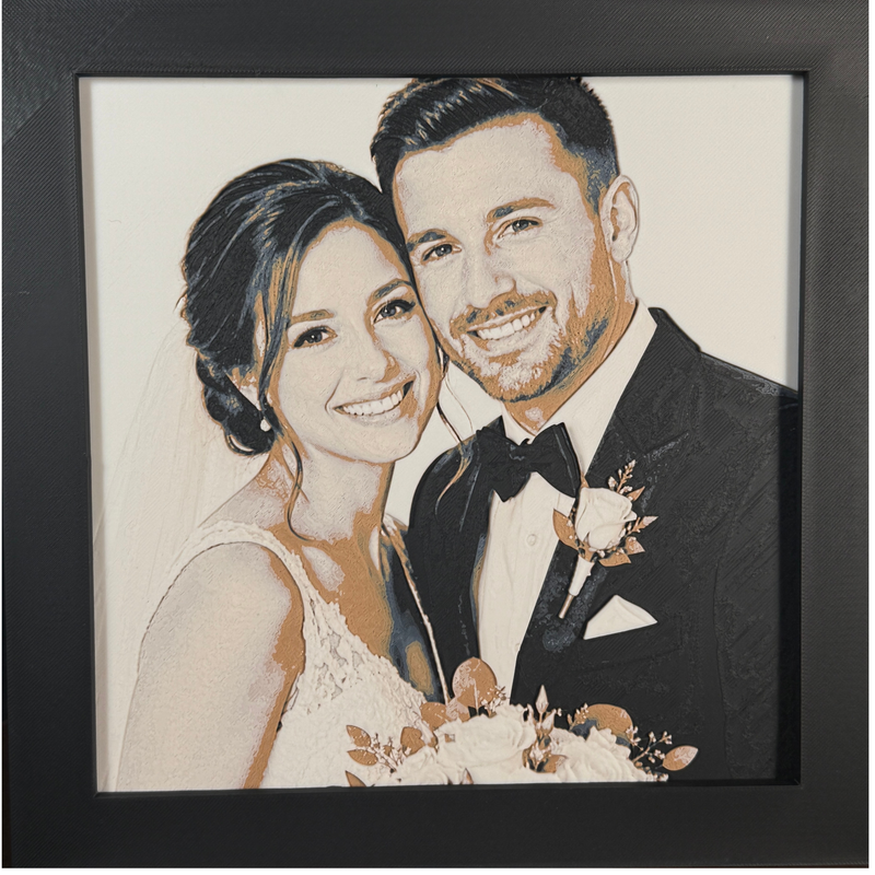 Custom framed 3D layered art piece showing a smiling wedding couple portrait, printed in layers by WTx3D.