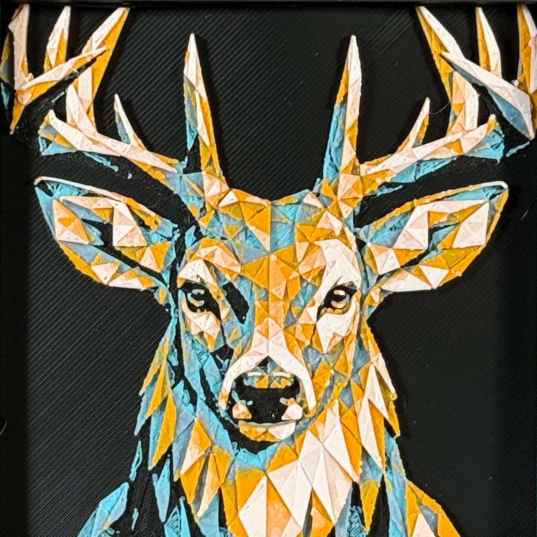 Framed geometric Buck deer layered 3D art piece featuring a front-facing buck design with a rich Teal Orange color palette and vibrant colorful antlers.