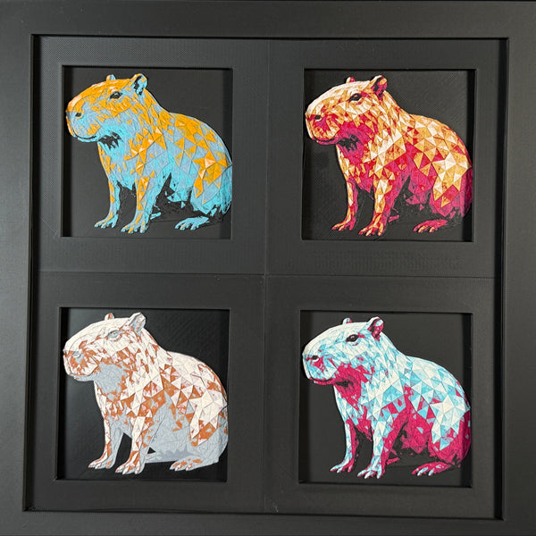 Four-panel framed geometric capybara layered 3D art set showing the capybara design in Heritage, Crimson Ice, Royal Gold, and Teal Orange color palettes inside a charcoal matte four-pack display frame.