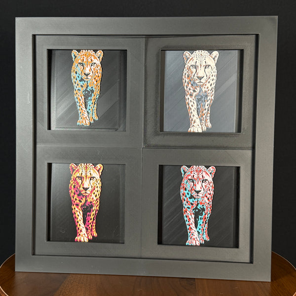 Four-panel framed geometric cheetah layered art set showing the same walking cheetah design in four WTX3D color palettes, arranged in a charcoal black 2x2 frame with spotted fur detail, sleek body shape, and high-contrast layered color.