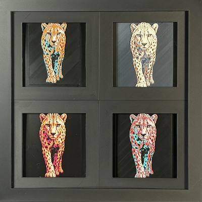 Four-panel framed geometric cheetah layered art set showing the same walking cheetah design in four WTX3D color palettes, arranged in a charcoal black 2x2 frame with spotted fur detail, sleek body shape, and high-contrast layered color.