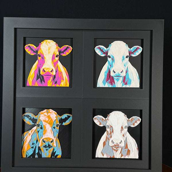 Four-panel framed geometric cow layered 3D art set showing the cow design in Heritage, Crimson Ice, Royal Gold, and Teal Orange color palettes inside a charcoal matte four-pack display frame.