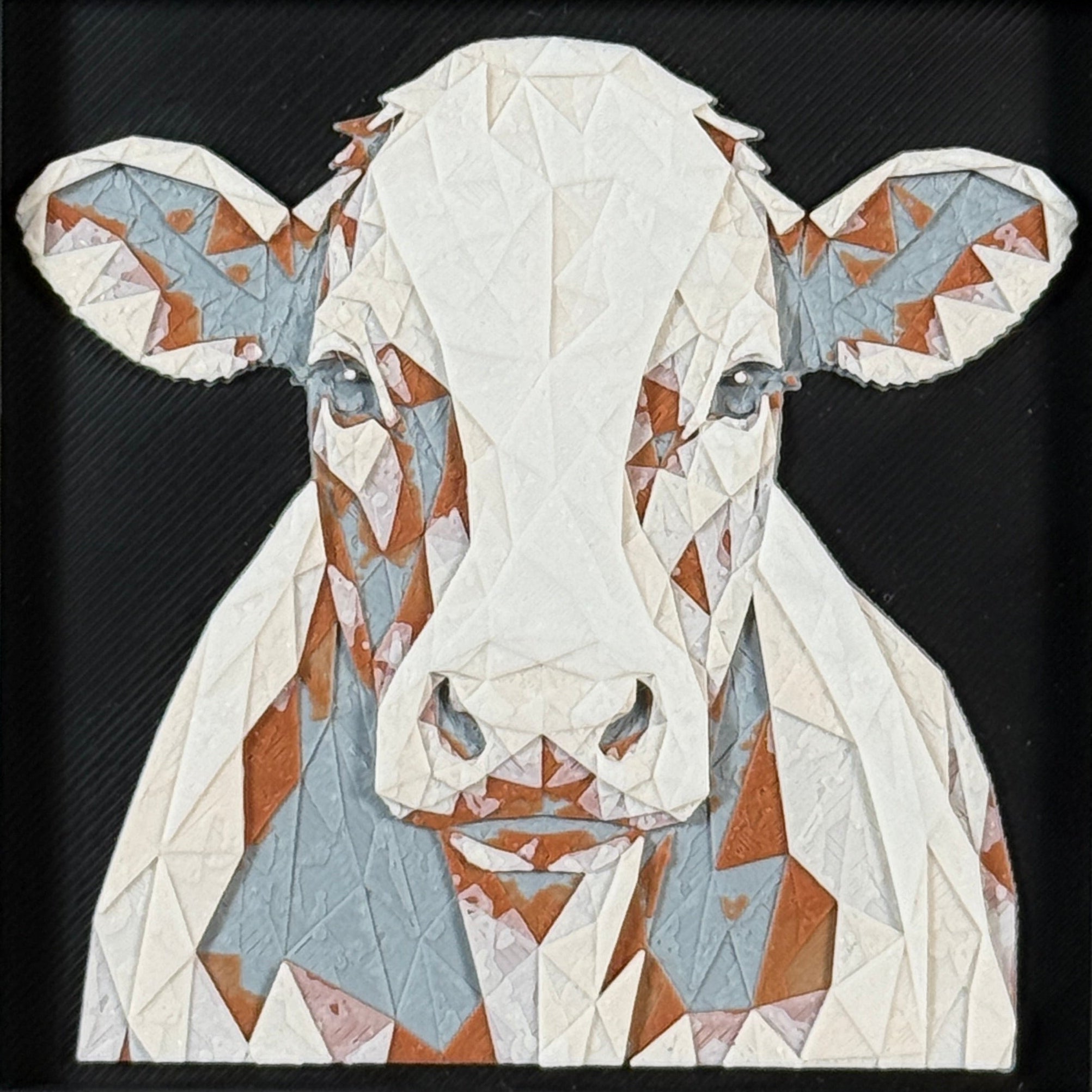 Geometric cow framed layered 3D art in Heritage color palette, featuring a bold cow portrait with soft white, gray, black, and neutral brown layered details inside a charcoal matte display frame.