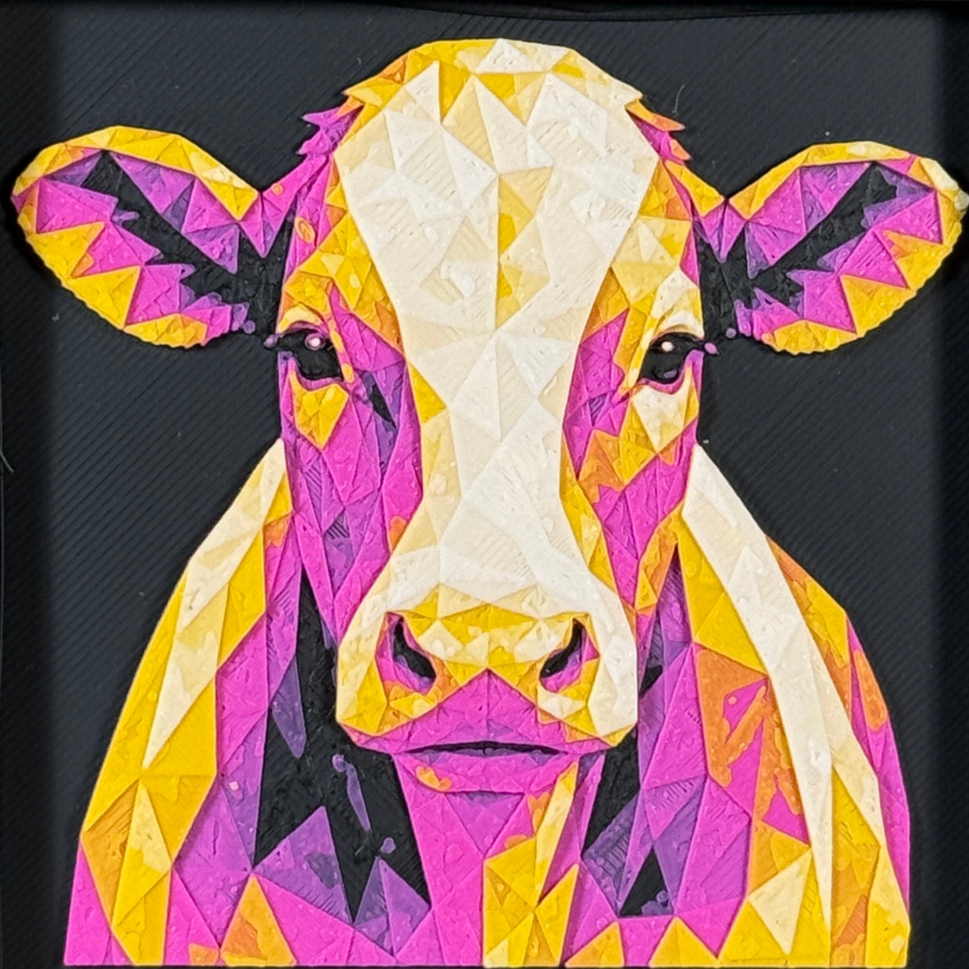 Geometric cow framed layered 3D art in Royal Gold color palette, featuring a bold cow portrait with gold, blue, black, and white layered details inside a charcoal matte display frame.