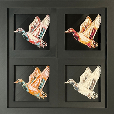 Four-panel framed geometric duck layered 3D art set showing the duck design in Heritage, Crimson Ice, Royal Gold, and Teal Orange color palettes inside a charcoal matte four-pack display frame.