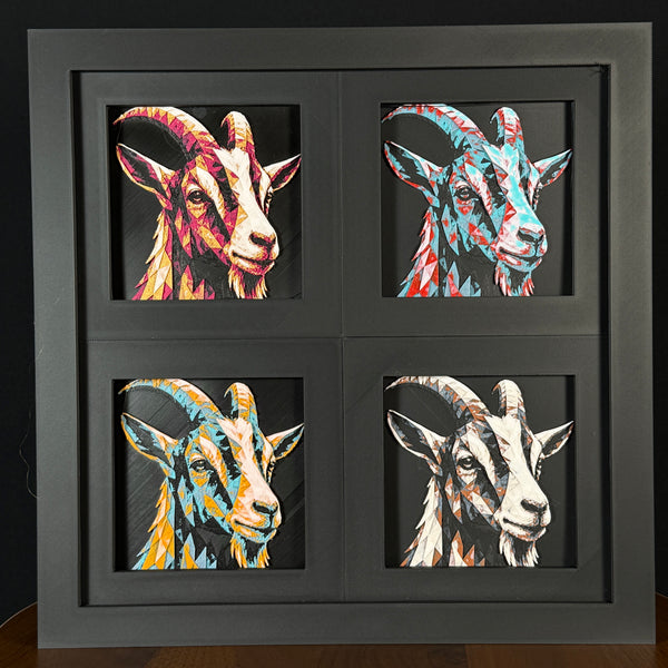 Four-panel framed geometric goat layered 3D art set showing the goat design in Heritage, Crimson Ice, Royal Gold, and Teal Orange color palettes inside a charcoal matte four-pack display frame.