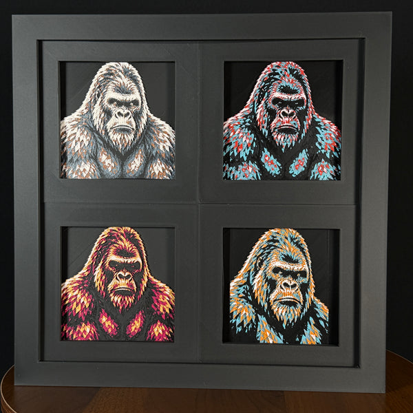 Four-panel framed geometric gorilla layered 3D art set showing the gorilla design in Heritage, Crimson Ice, Royal Gold, and Teal Orange color palettes inside a charcoal matte four-pack display frame.