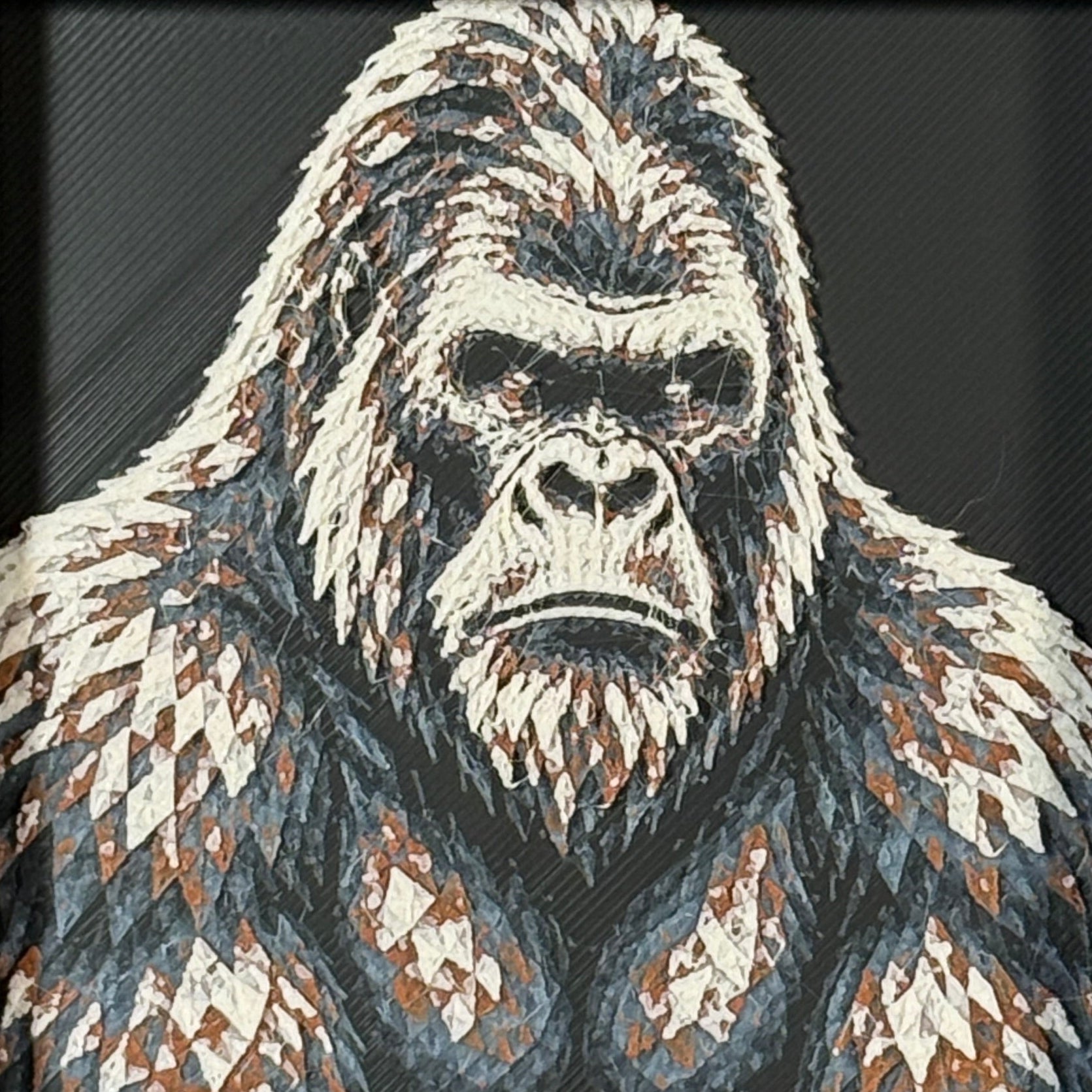 Geometric gorilla framed layered 3D art in Heritage color palette, featuring a bold gorilla portrait with soft white, gray, black, and neutral brown layered details inside a charcoal matte display frame.