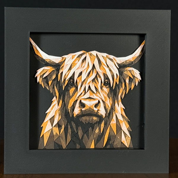 Geometric cow framed layered 3D art in Heritage color palette, featuring a bold cow portrait with soft white, gray, black, and neutral brown layered details inside a charcoal matte display frame.