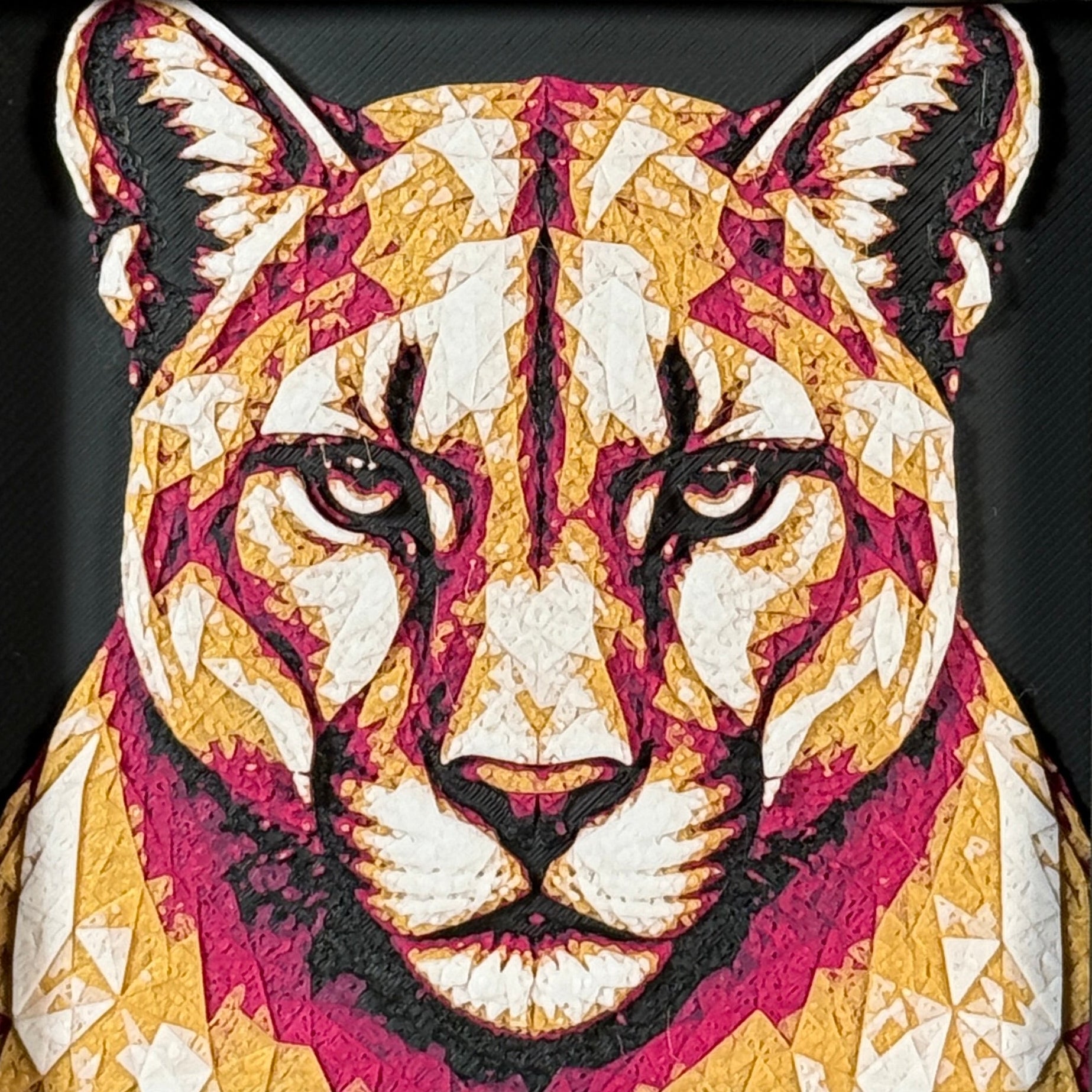 Geometric mountain lion framed layered 3D art in Royal Gold color palette, featuring a bold mountain lion portrait with gold, blue, black, and white layered details inside a charcoal matte display frame.