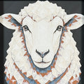 Geometric sheep framed layered 3D art in Heritage color palette, featuring a sheep portrait with soft white, gray, black, and neutral layered details inside a charcoal matte display frame.