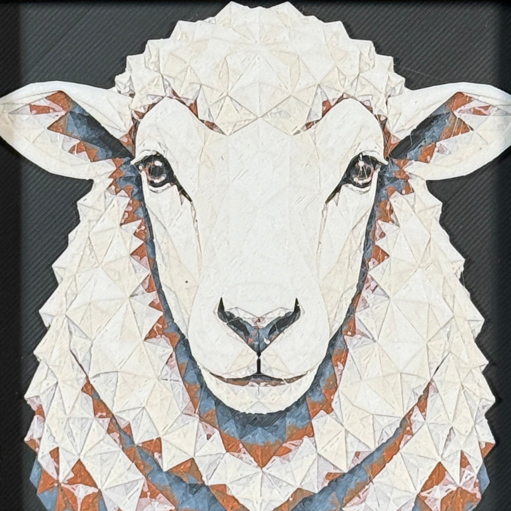Geometric sheep framed layered 3D art in Heritage color palette, featuring a sheep portrait with soft white, gray, black, and neutral layered details inside a charcoal matte display frame.