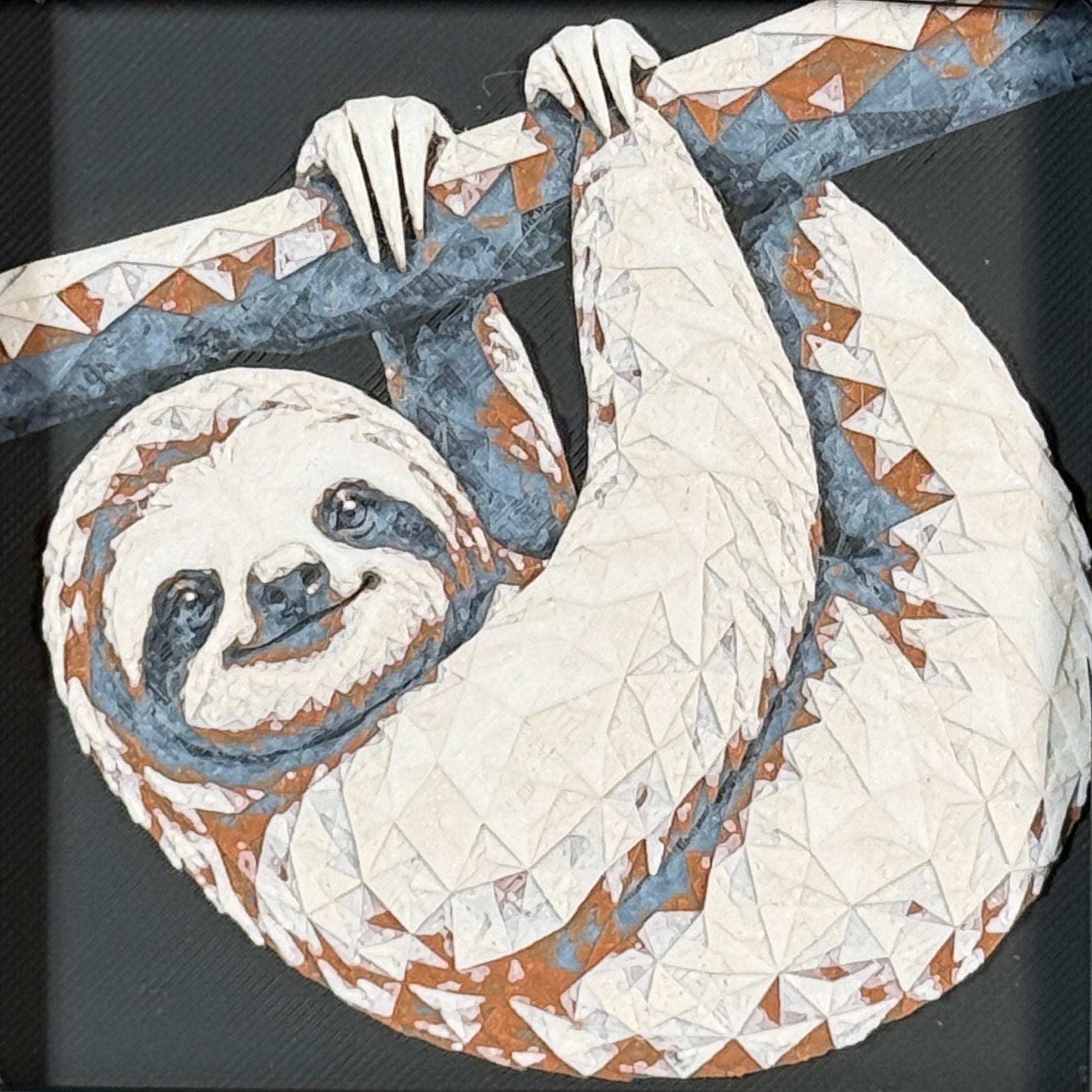 Geometric sloth framed layered 3D art in Heritage color palette, featuring a curled sloth design with soft white, gray, black, and neutral layered details inside a charcoal matte display frame.