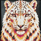 Geometric snow leopard framed layered 3D art in Heritage color palette, featuring a snow leopard portrait with soft white, gray, black, and neutral layered details inside a charcoal matte display frame.