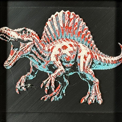 Framed geometric Spinosaurus layered 3D art piece featuring a stylized dinosaur design in a vibrant Crimson Ice color palette.