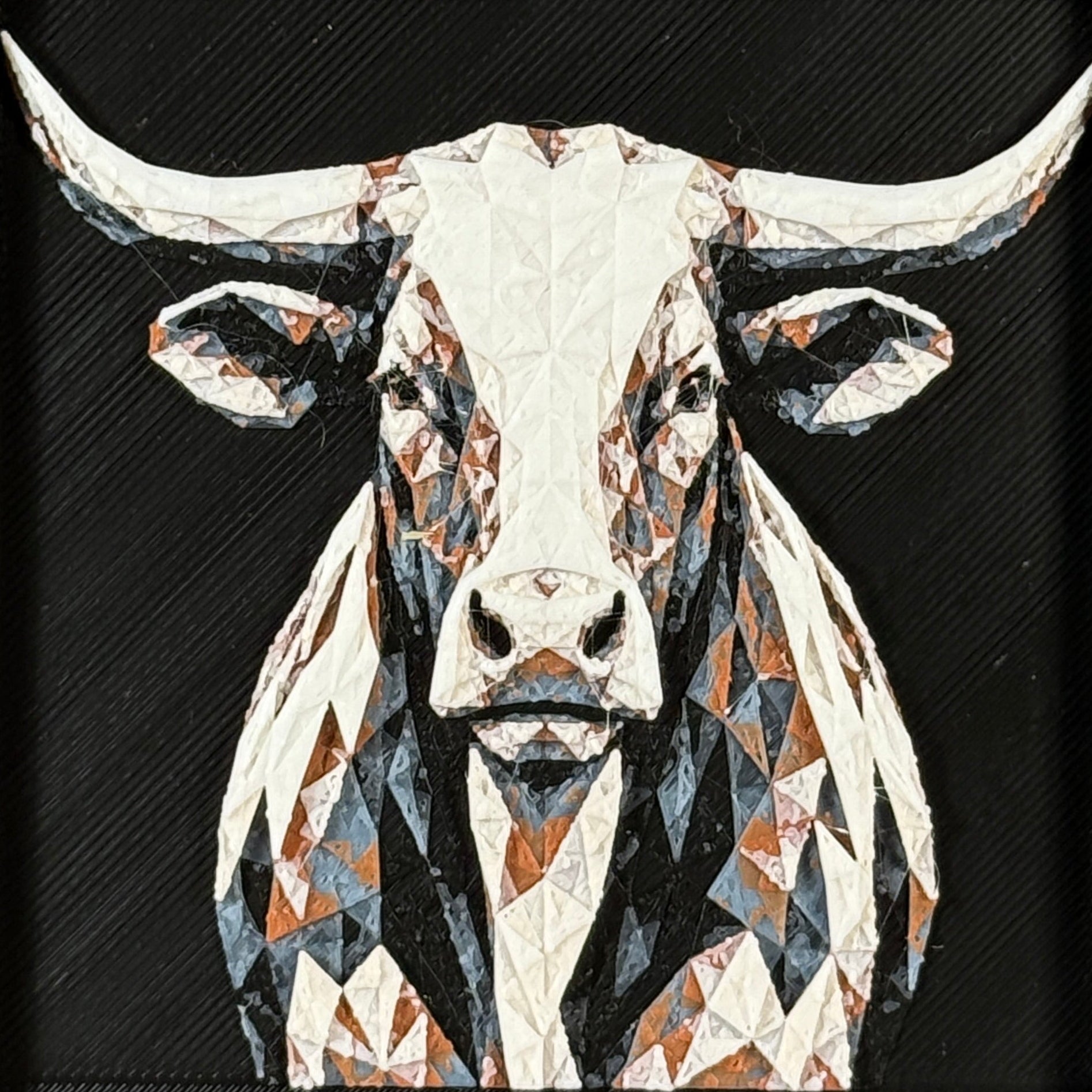 Geometric steer framed layered 3D art in Heritage color palette, featuring a bold steer portrait with soft white, gray, black, and neutral brown layered details inside a charcoal matte display frame.