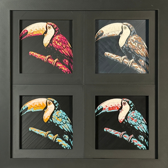 Four-panel framed geometric toucan layered 3D art set showing the toucan design in Heritage, Crimson Ice, Royal Gold, and Teal Orange color palettes inside a charcoal matte four-pack display frame.