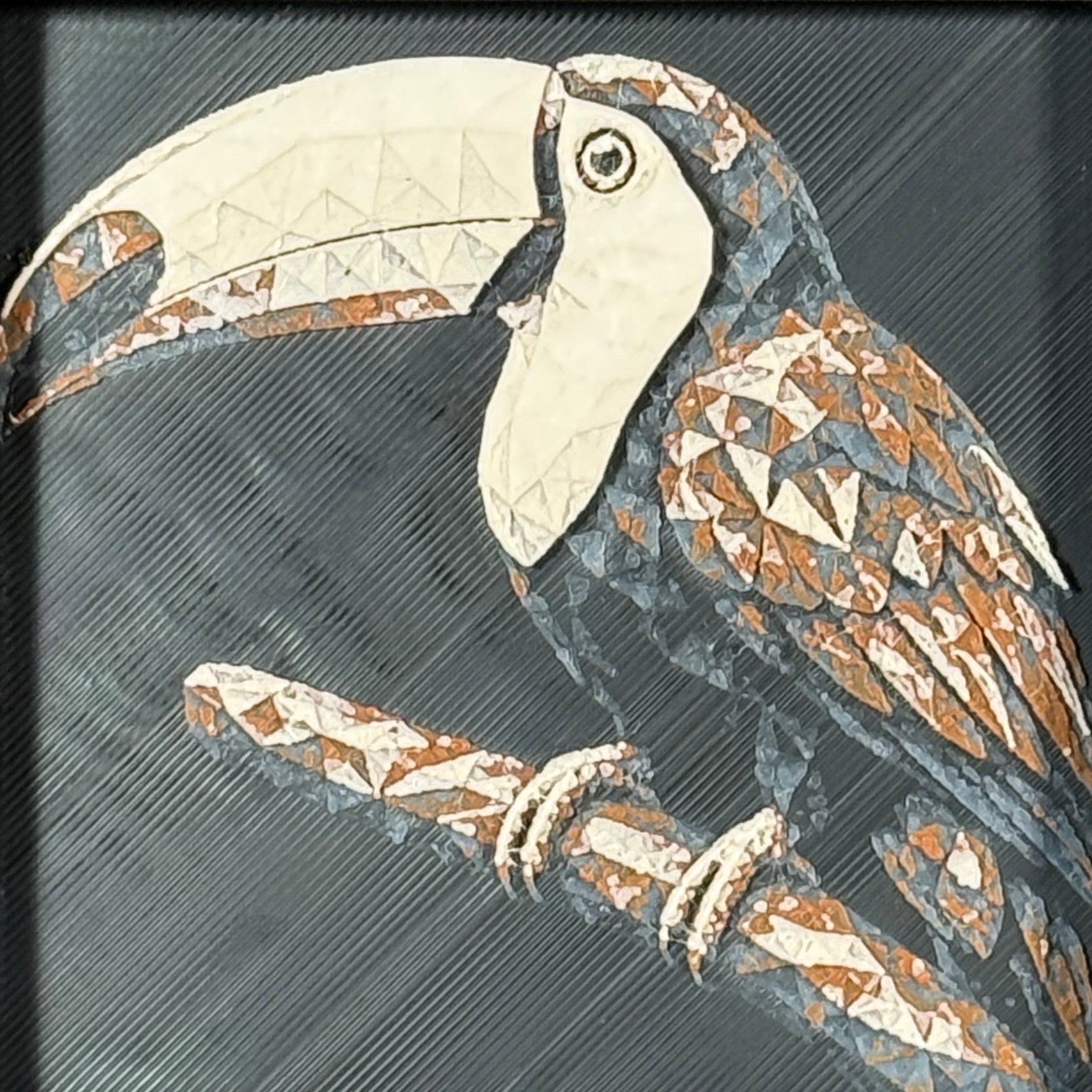 Geometric toucan framed layered 3D art in Heritage color palette, featuring a toucan portrait with soft white, gray, black, and neutral brown layered details inside a charcoal matte display frame.