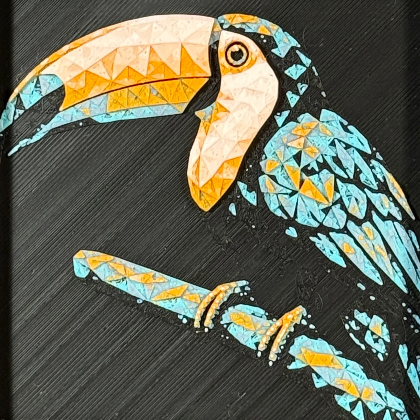 Geometric toucan framed layered 3D art in Teal Orange color palette, featuring a toucan portrait with turquoise, orange, black, and white layered details inside a charcoal matte display frame.