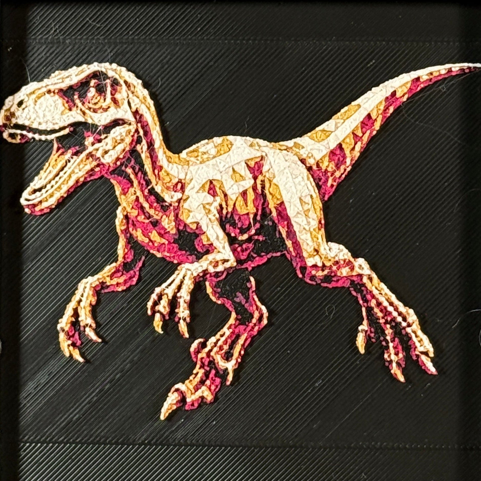 Framed geometric Velociraptor layered 3D art piece featuring a stylized dinosaur design in a rich Royal Gold color palette with gold and orange highlights.