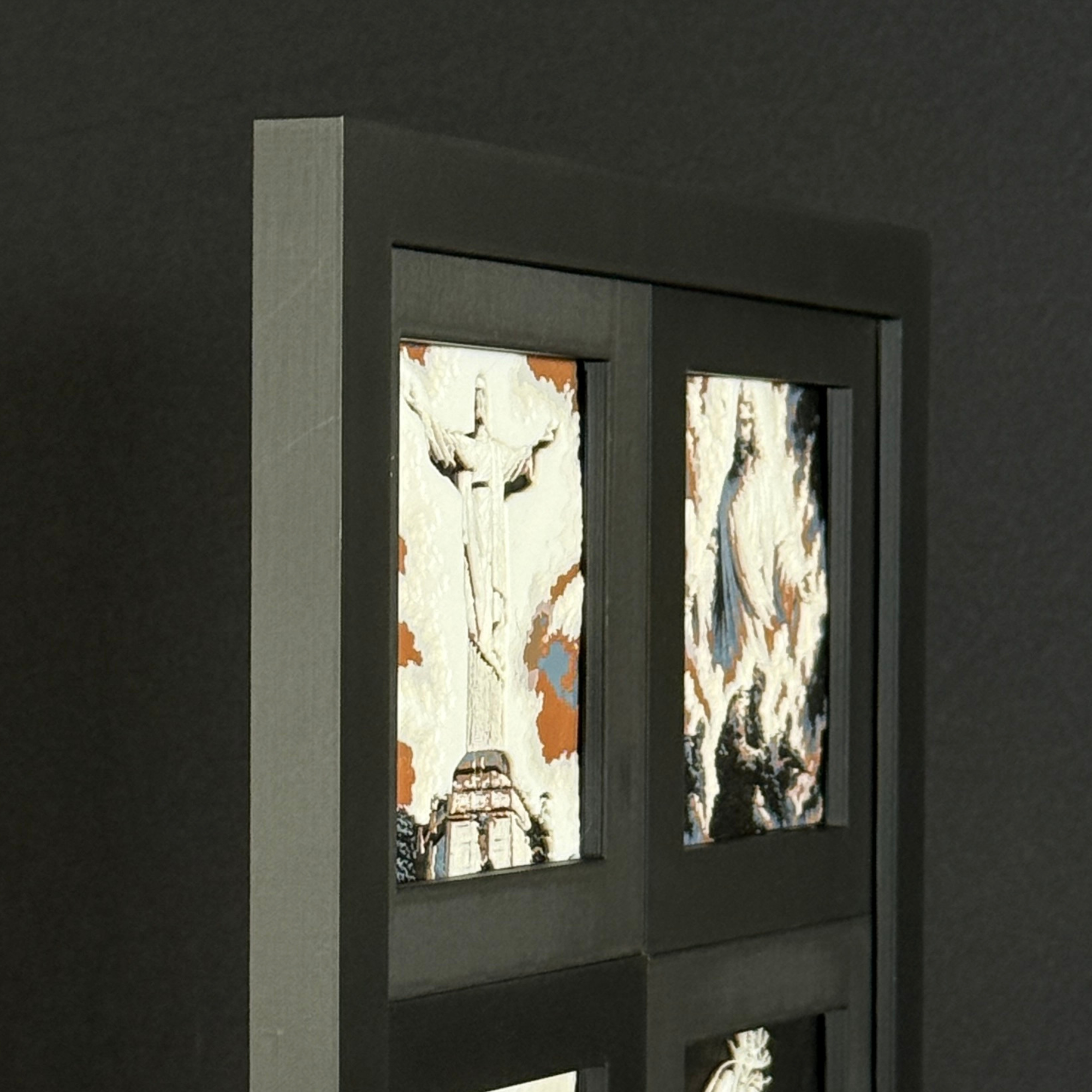 Angled view of a Faith four-panel framed 3D layered art piece showing the physical stacked layers and real depth of the artwork