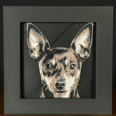 Framed 3D layered art piece featuring a highly detailed, textured portrait of a Miniature Pinscher dog with large erect ears, alert eyes, and a classic black and tan coat pattern.