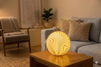 Ripple 3D printed lamp, displayed in a family room setting.