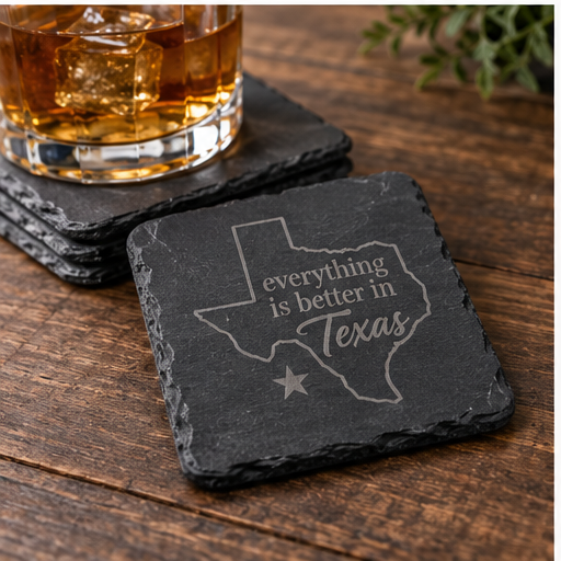 Representative image: Dark square coaster displaying a Texas outline and Everything Is Better in Texas lettering beside a drink.
