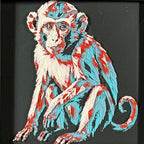 Geometric monkey layered art in Crimson Ice palette in a black frame