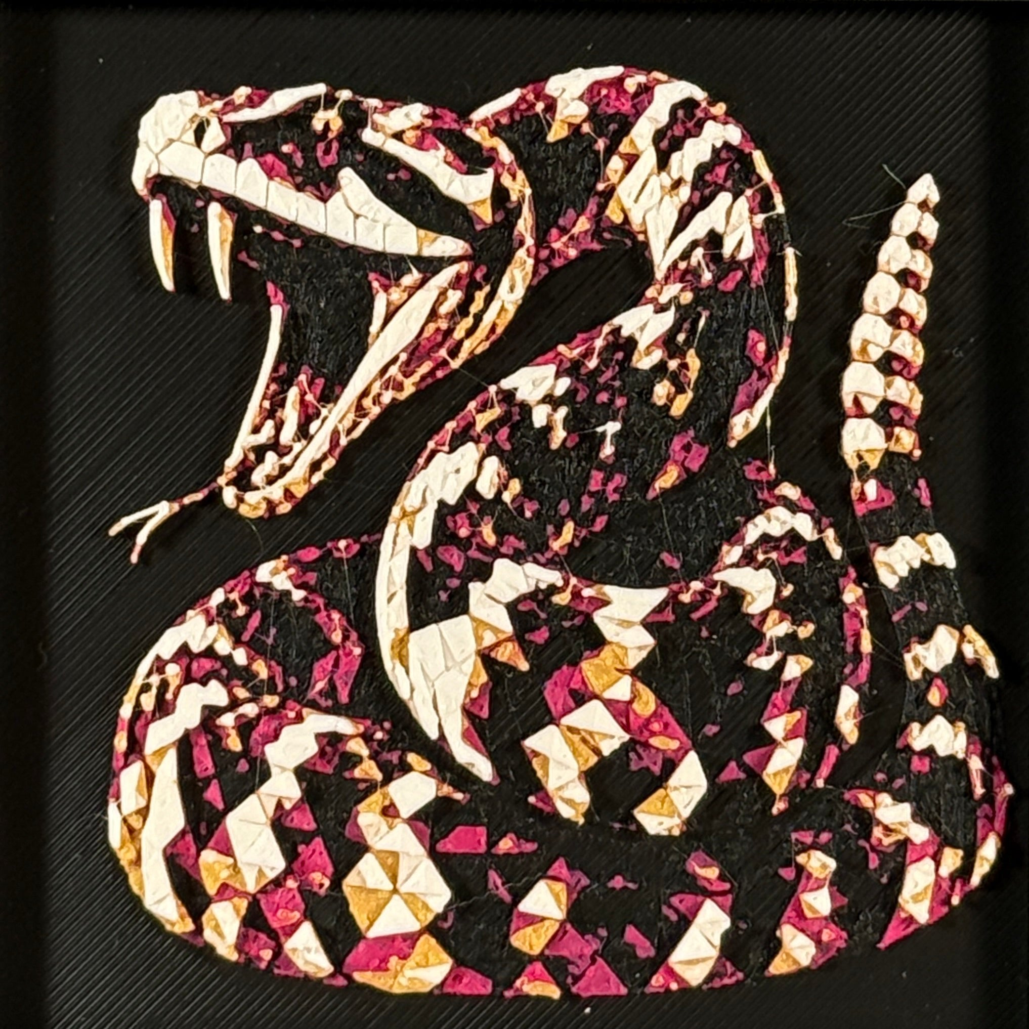 Geometric rattlesnake layered art in Royal Gold palette in a black frame