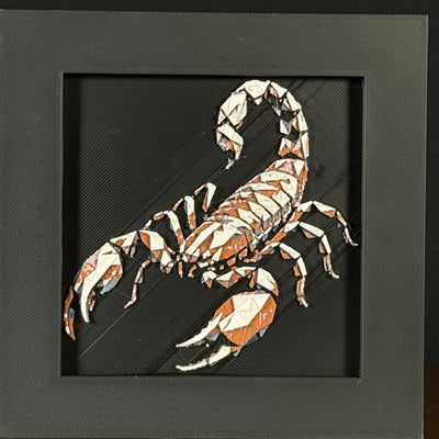 Geometric scorpion layered art in Heritage palette in a black frame